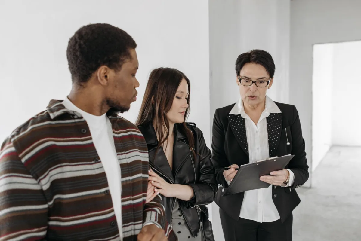 Agent going through the representation agreement with buyers