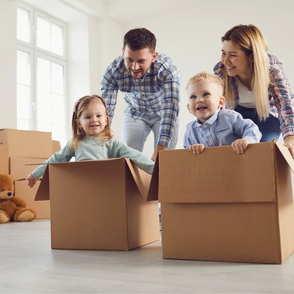 Household unpacking moving boxes after a move